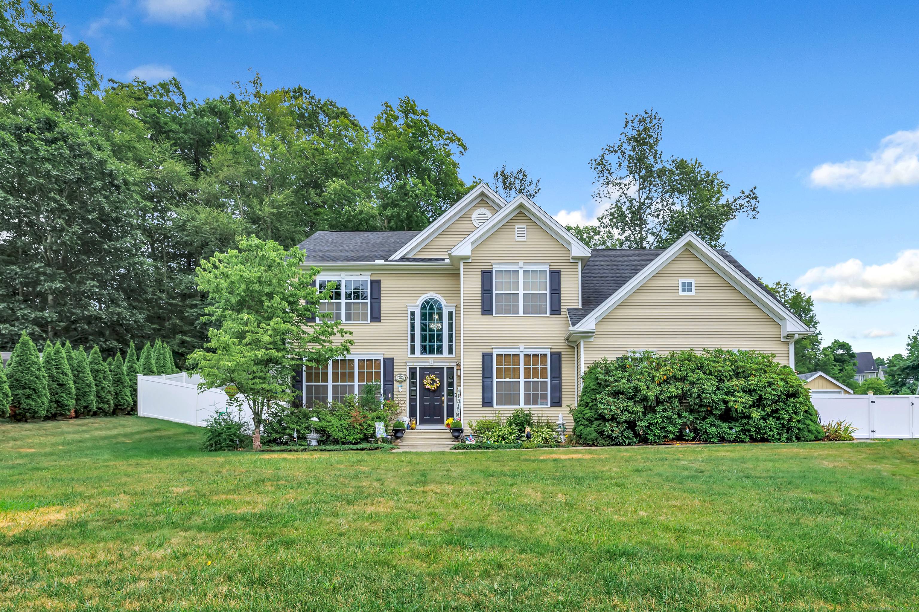 Step into timeless elegance with this beautifully crafted Colonial boasting 2828 sq ft, of luxurious living space, 4 Beds, 2.