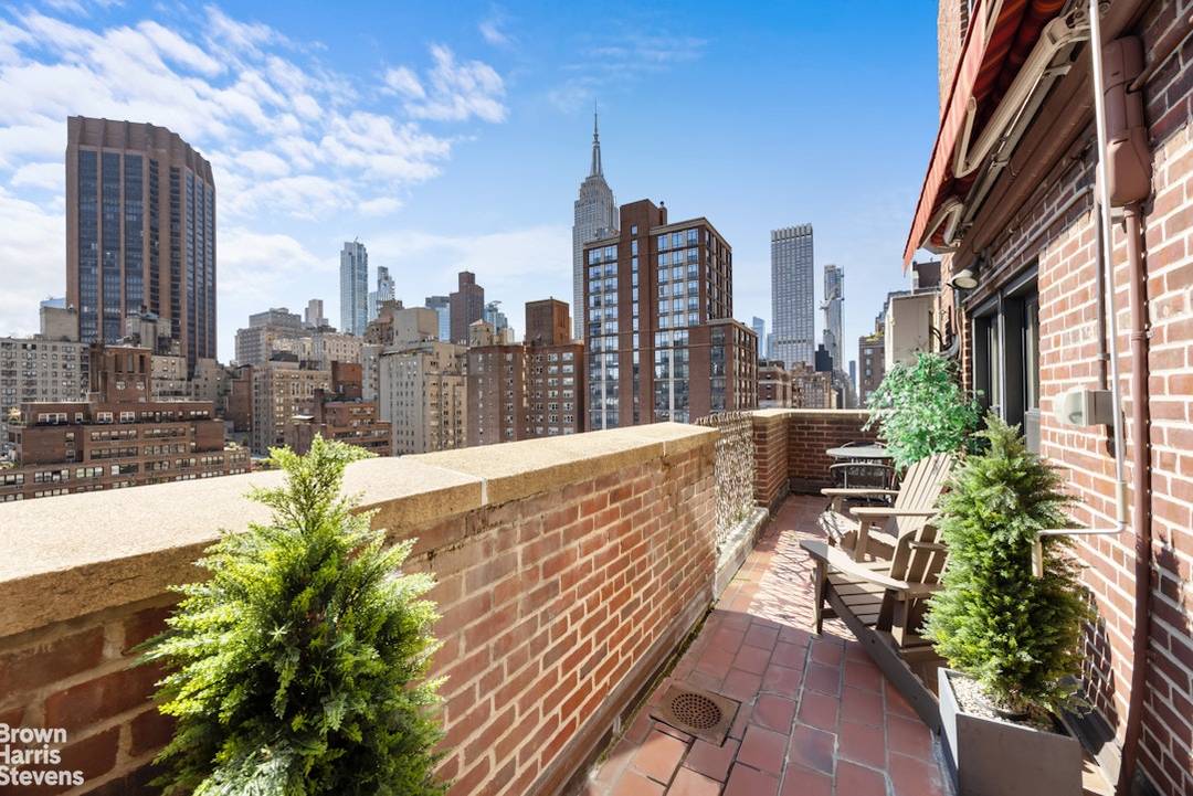 Charming, sunny, terraced one bedroom apartment with open south and west exposures for full city views in a full service pre war co op on a charming tree lined Murray ...