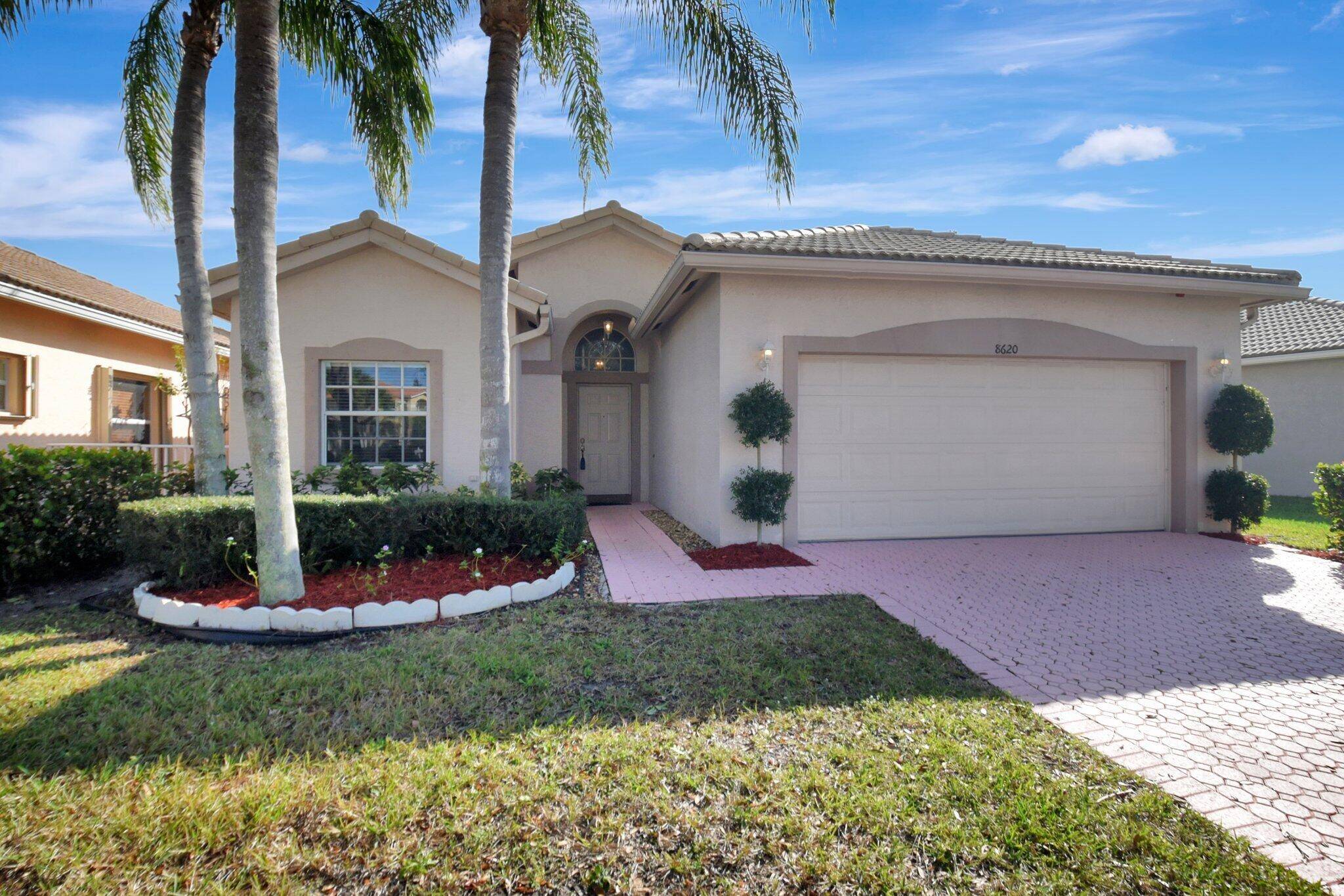 Discover this stunning 3 bed, 2 bath home located in the sought after gated community of Andros Isle in West Palm Beach.