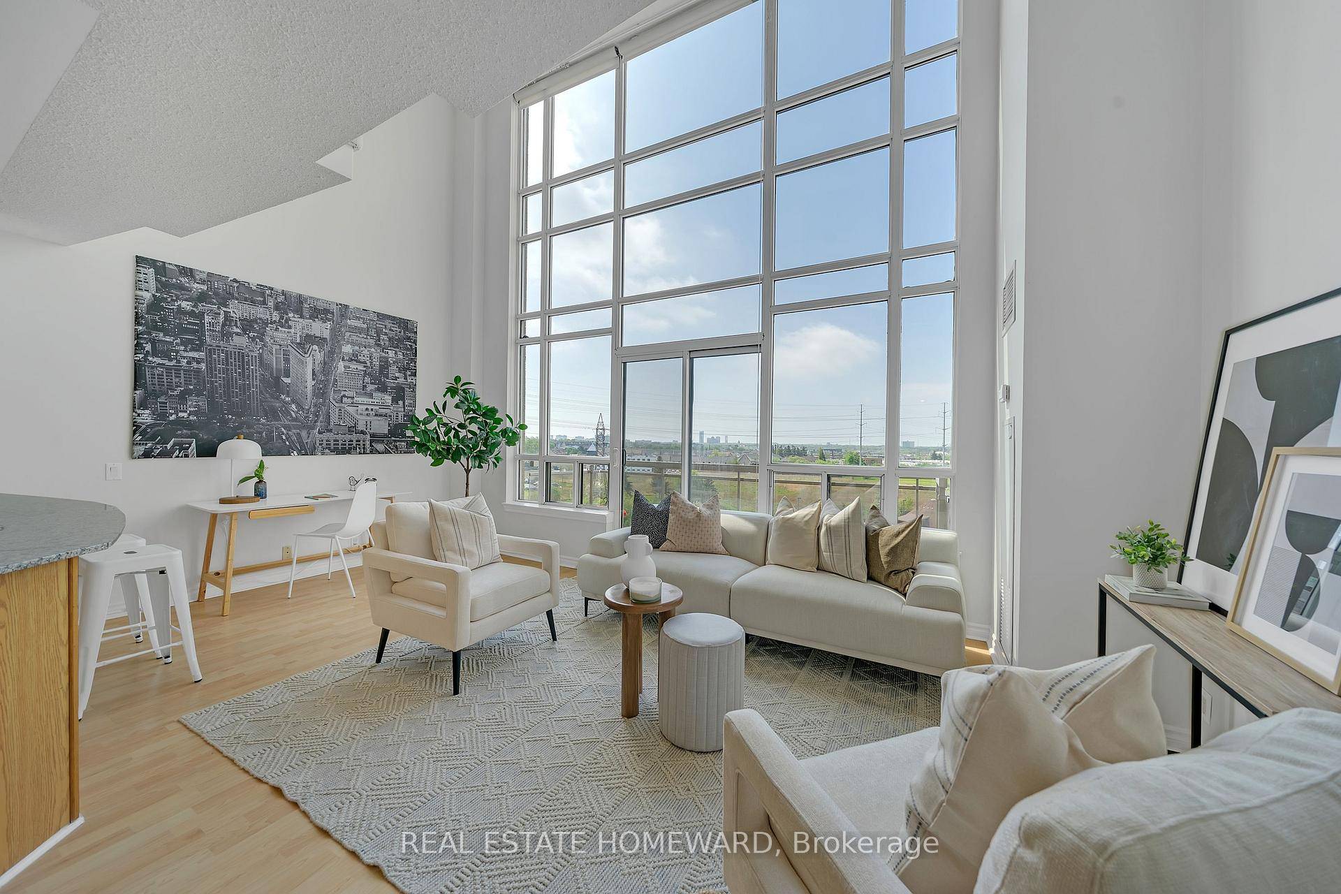 Rarely available with 2 Parking Spots and incredibly spacious, this stunning 2 storey Loft offers a bright, open concept design enhanced by soaring 18 ft floor to ceiling windows.