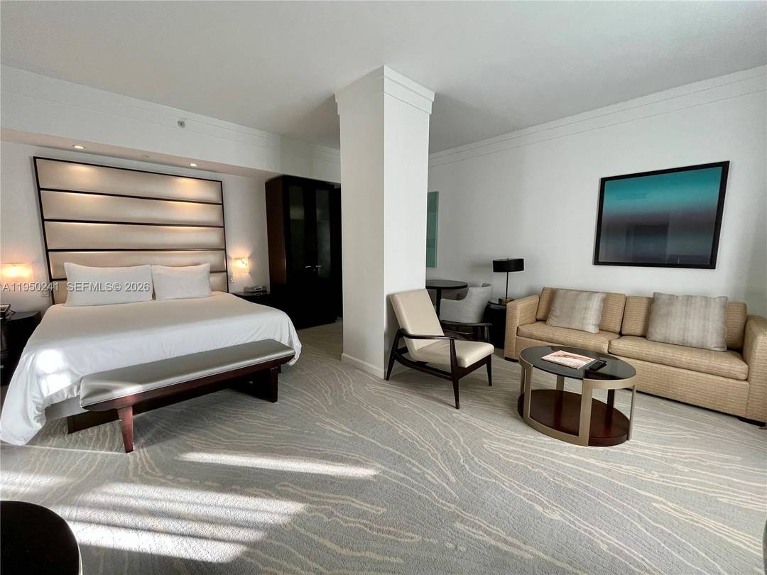 Excellent opportunity to own a 620 SQFT junior suite condo hotel residence at Fontainebleau III, offering tranquil garden and water fountain views.