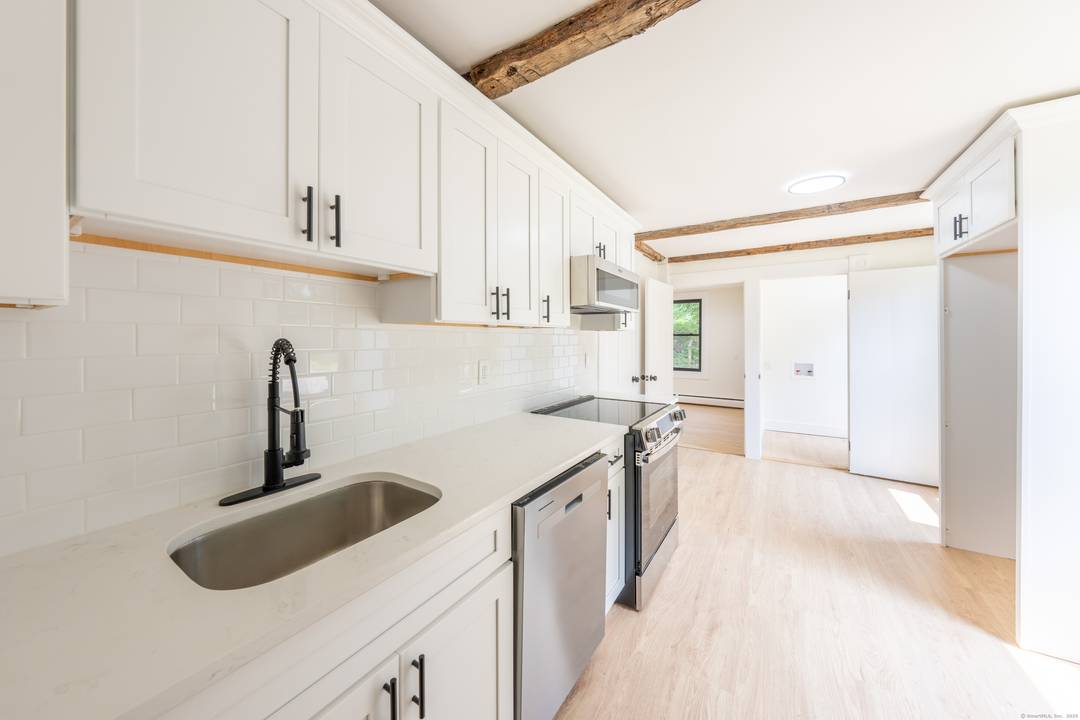 Clean, turnkey and ready for immediate occupancy, this antique home is a blend of rustic charm and modern finishes.