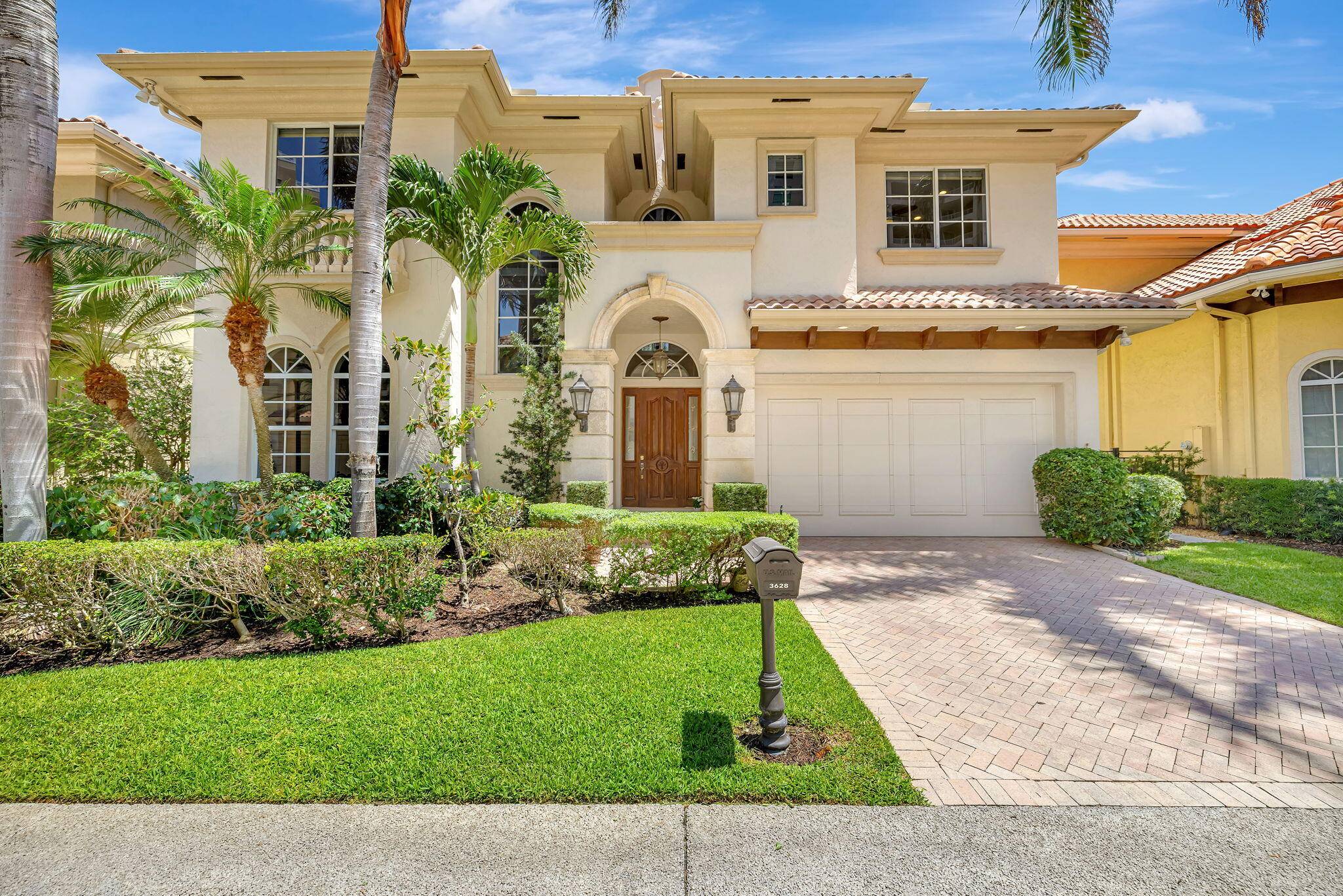 Exquisite 4 BD 4 BA beachside home in the gated enclave of Ocean Grande Place.