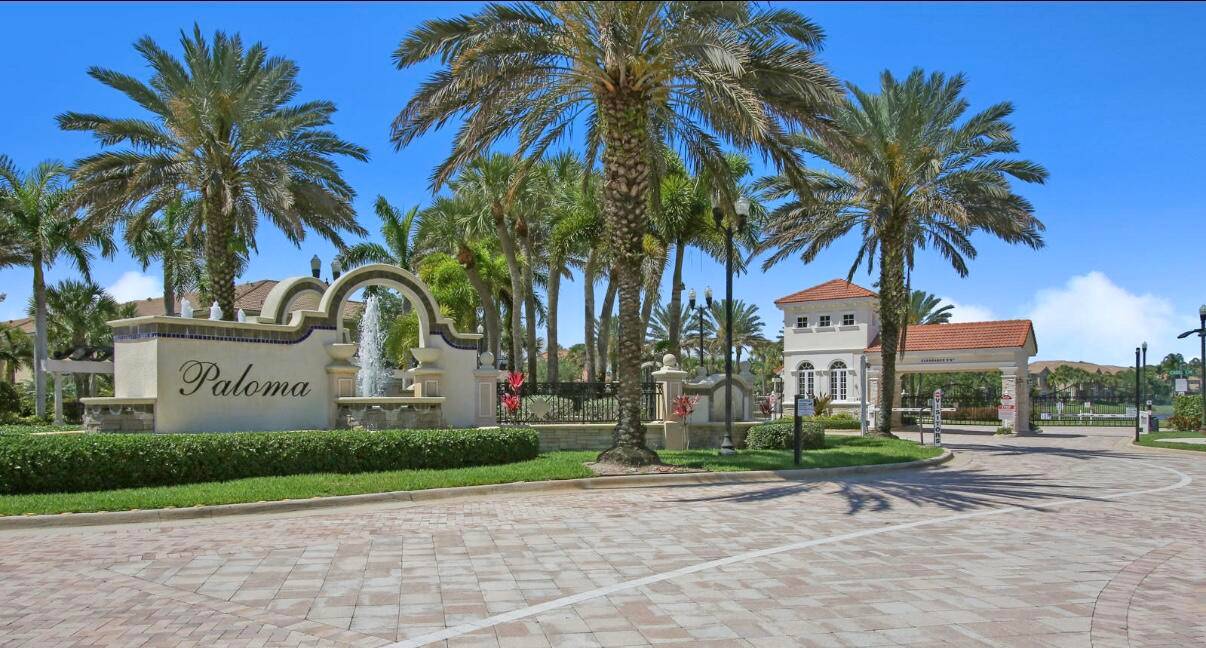 Great Location ! Beautiful end unit in gated community of Paloma across from resort style pool.