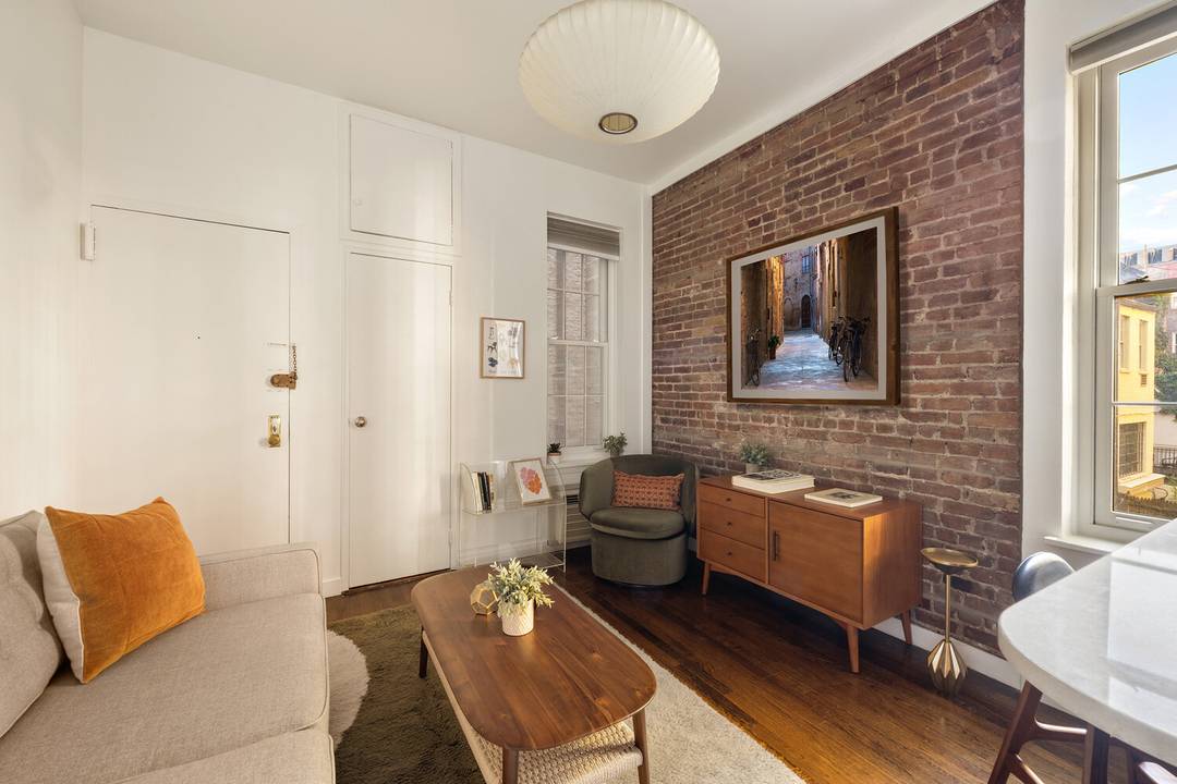 Welcome to 345 West 21st Street, tucked along one of Chelsea's most picturesque tree lined blocks !