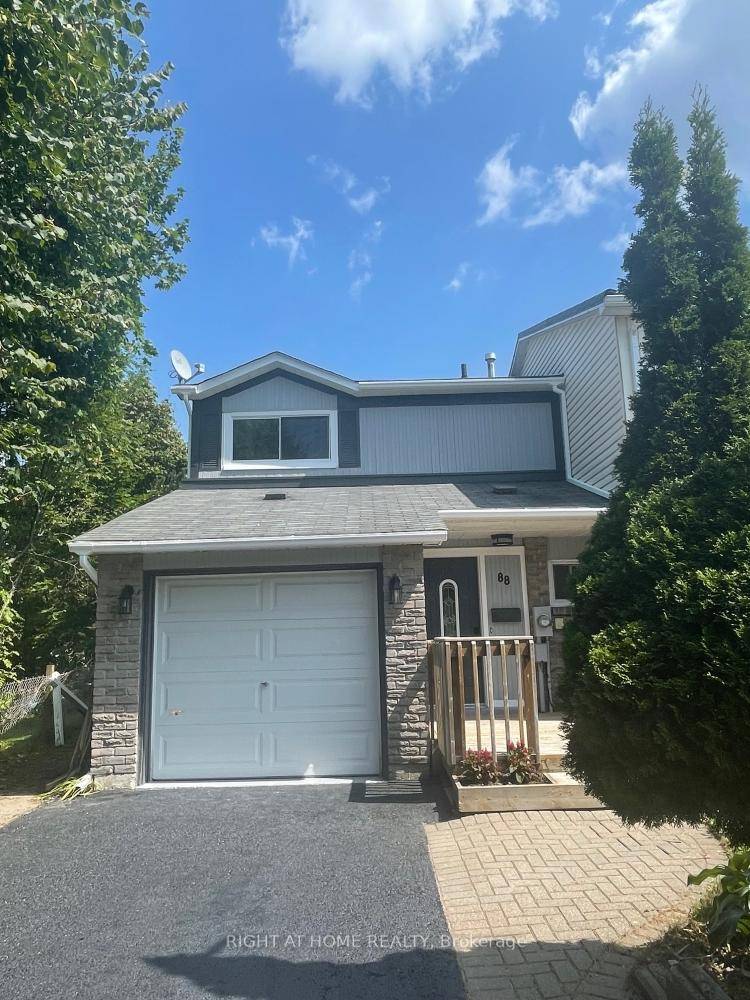 This Semi detached home sits on a Quiet street in a mature treed area.