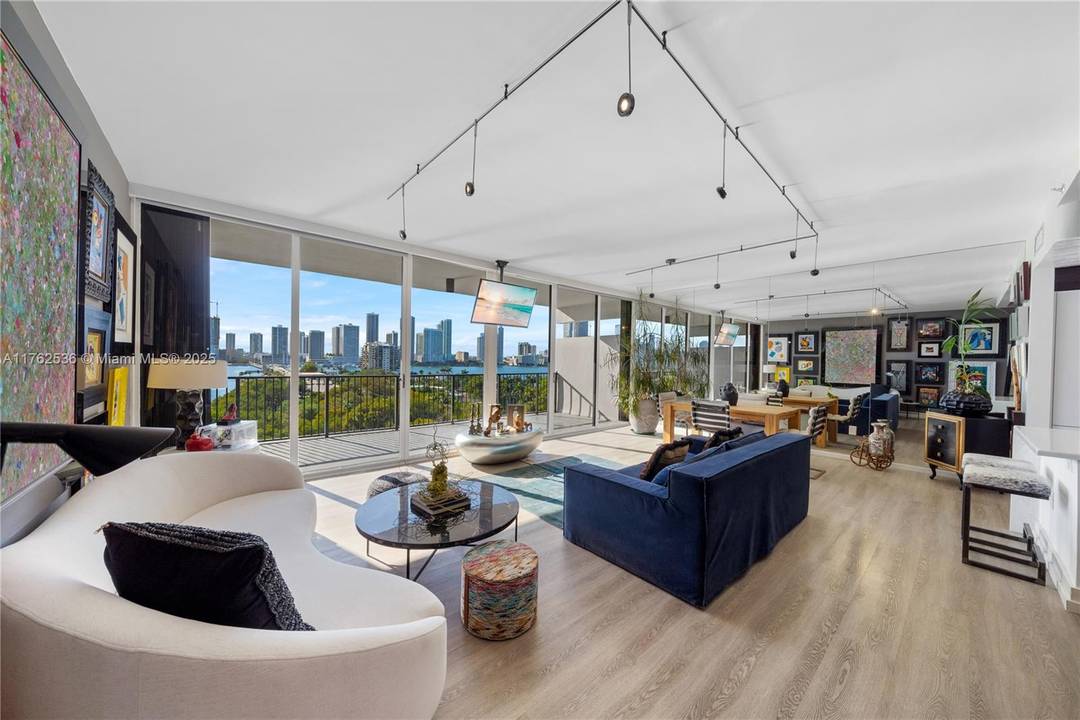 MODERN INDUSTRIAL DESIGN DUPLEX WITH BREATHTAKING MIAMI SUNSET VIEWS OVER THE SPARKLING BAY amp ; MIAMI SKYLINE ON THE COVETED VENETIAN ISLANDS !