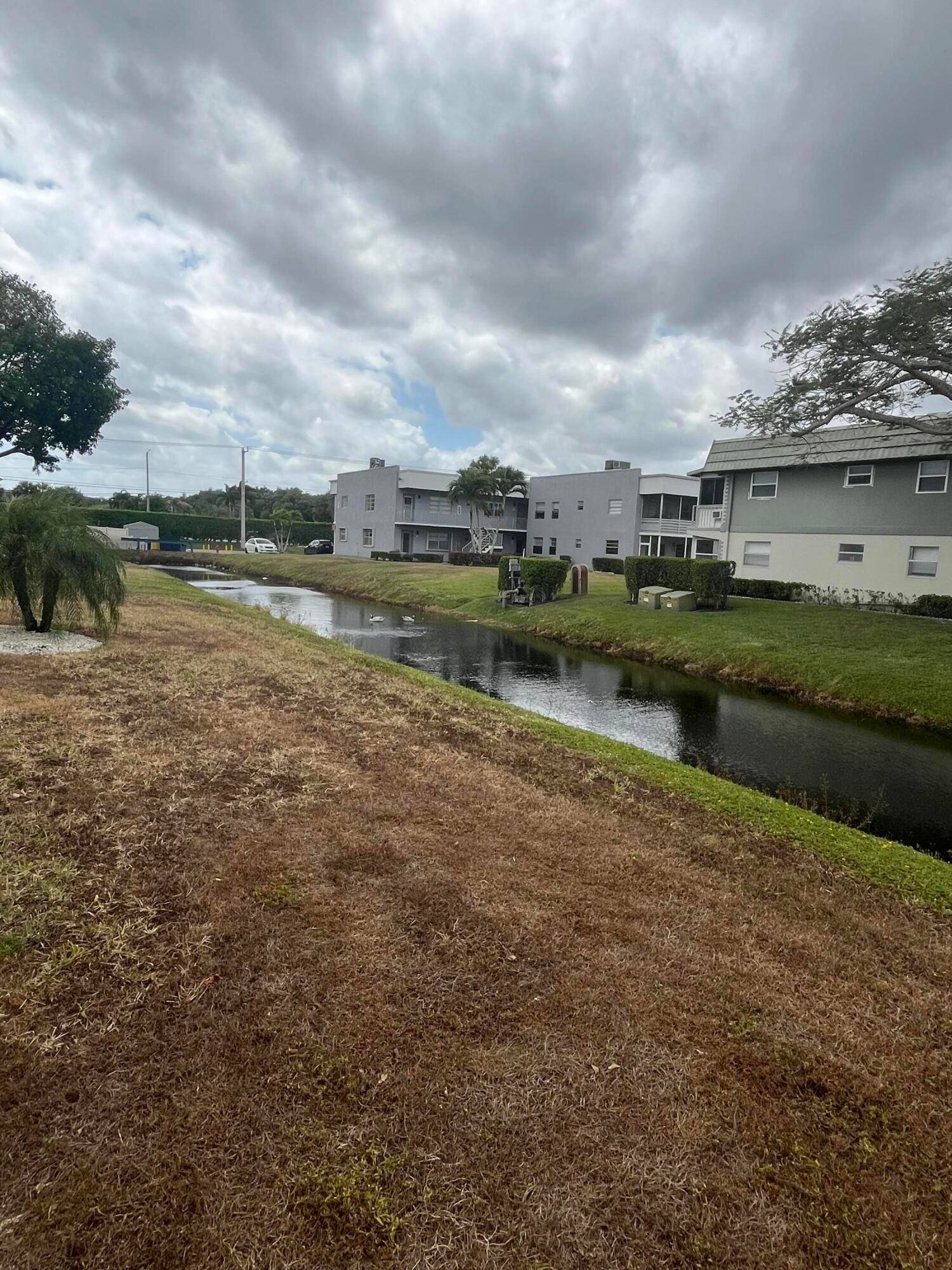 great privacy location. True 2nd floor corner unit overlooking the canal waterway and the open garden area.