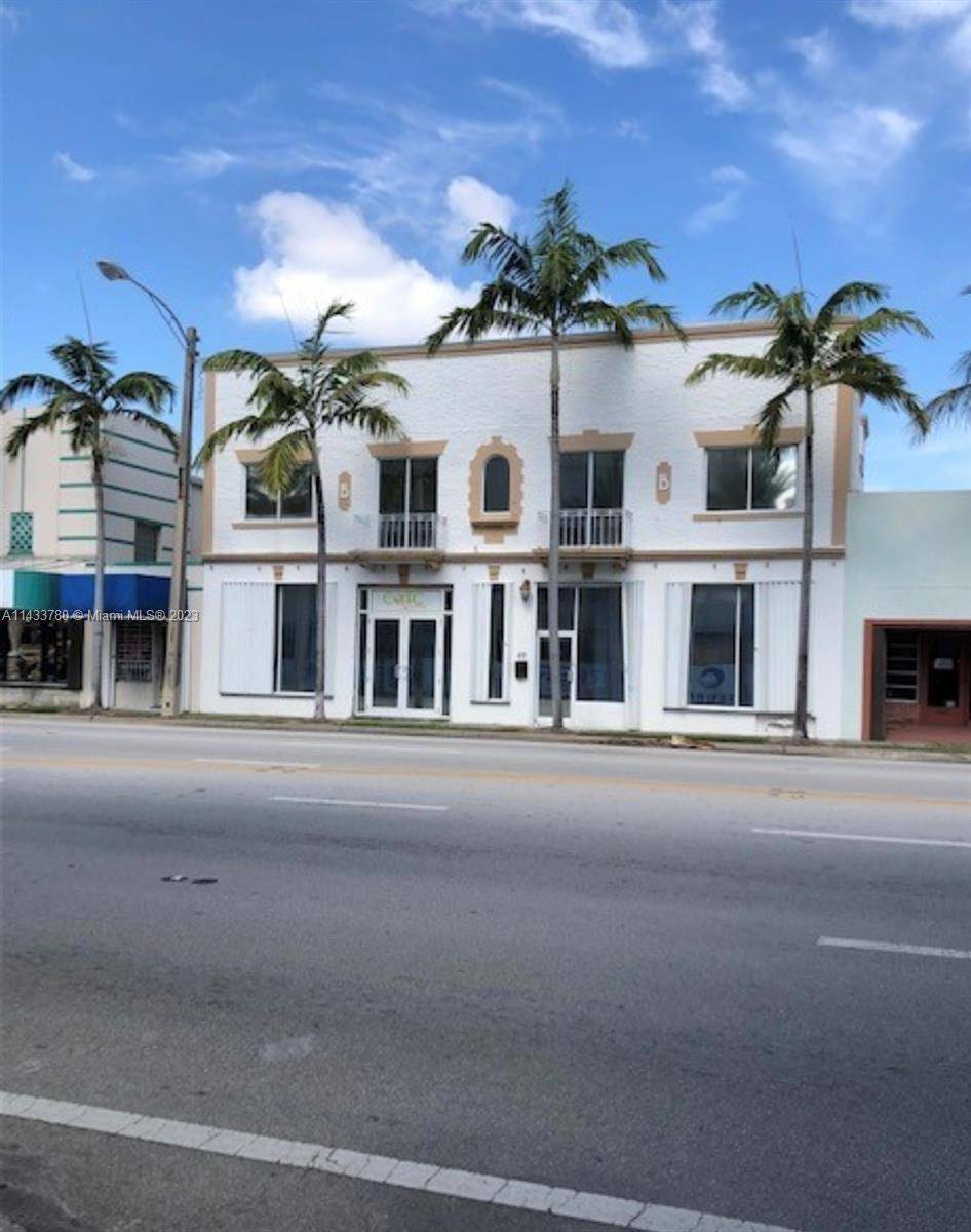 Amazing location ! ! Two Story Art Deco building with large stairway to 2nd floor.
