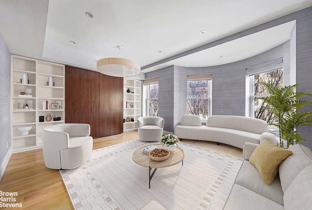 A Luxurious 3 bed, 3 bath duplex in one of a kind townhouse discreetly tucked behind a historic 19th century facade.