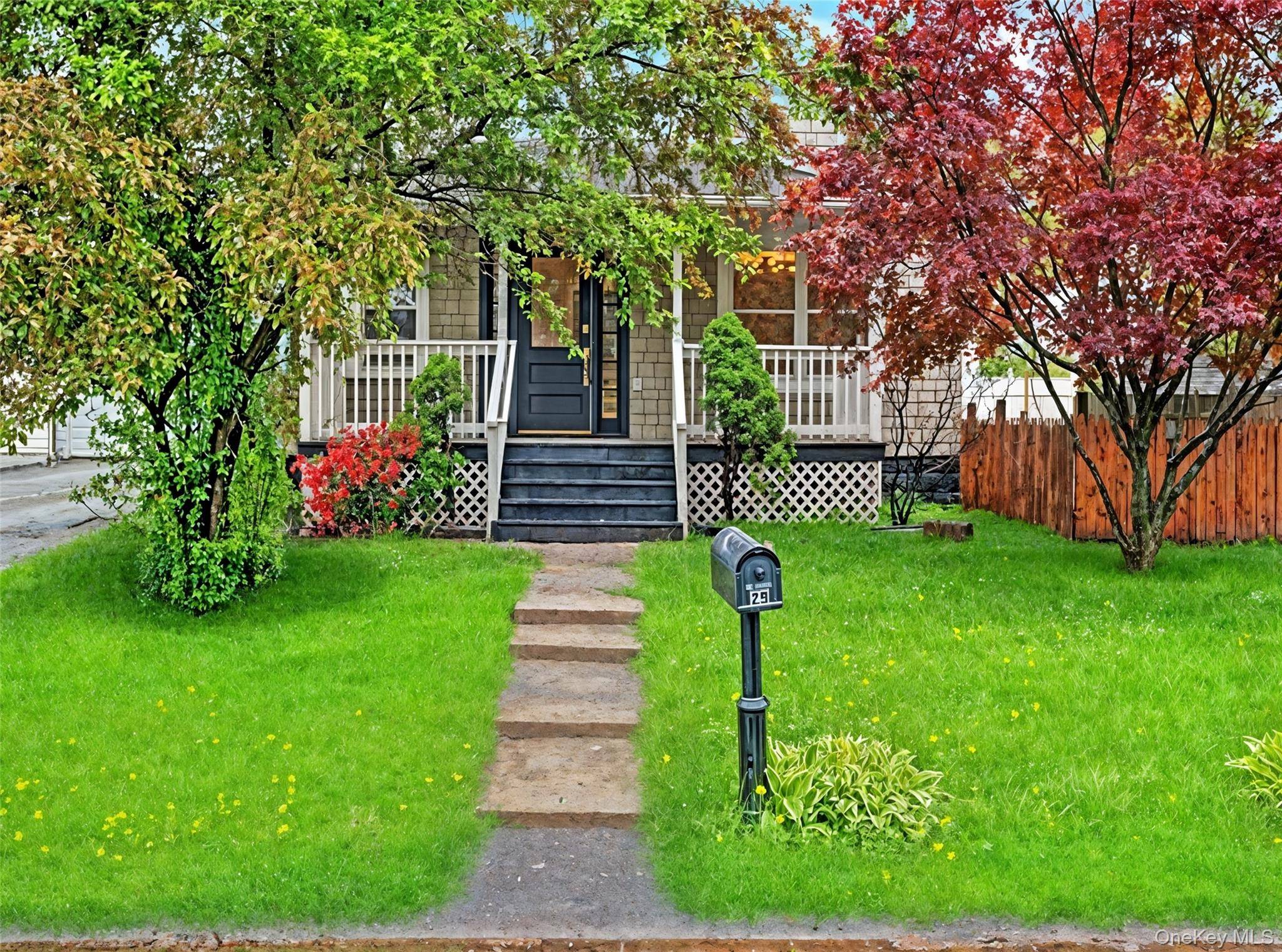 Imagine coming home to this beautifully renovated Cape Cod, where every detail has been thoughtfully updated.