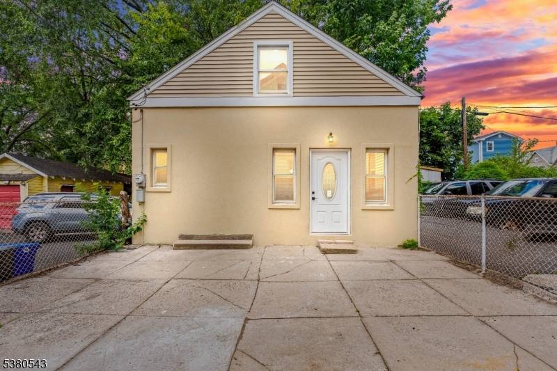 Beautiful colonial home with a Fully renovated 2nd house at the back with a tankless water heater.