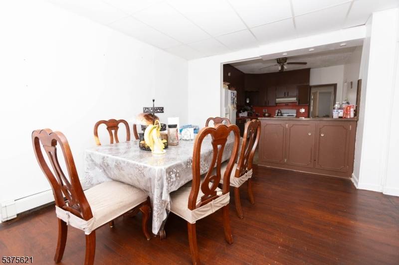 This inviting single family ranch features a formal dining room, living room with hardwood floors, and a private backyard perfect for outdoor enjoyment.