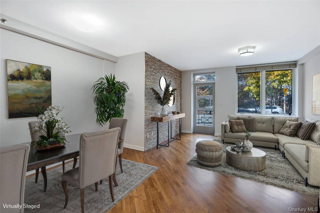 Discover a truly unique triplex condo in Bay Ridge that offers the space, comfort, and flexibility of a full sized house without sacrificing the convenience of condominium living.