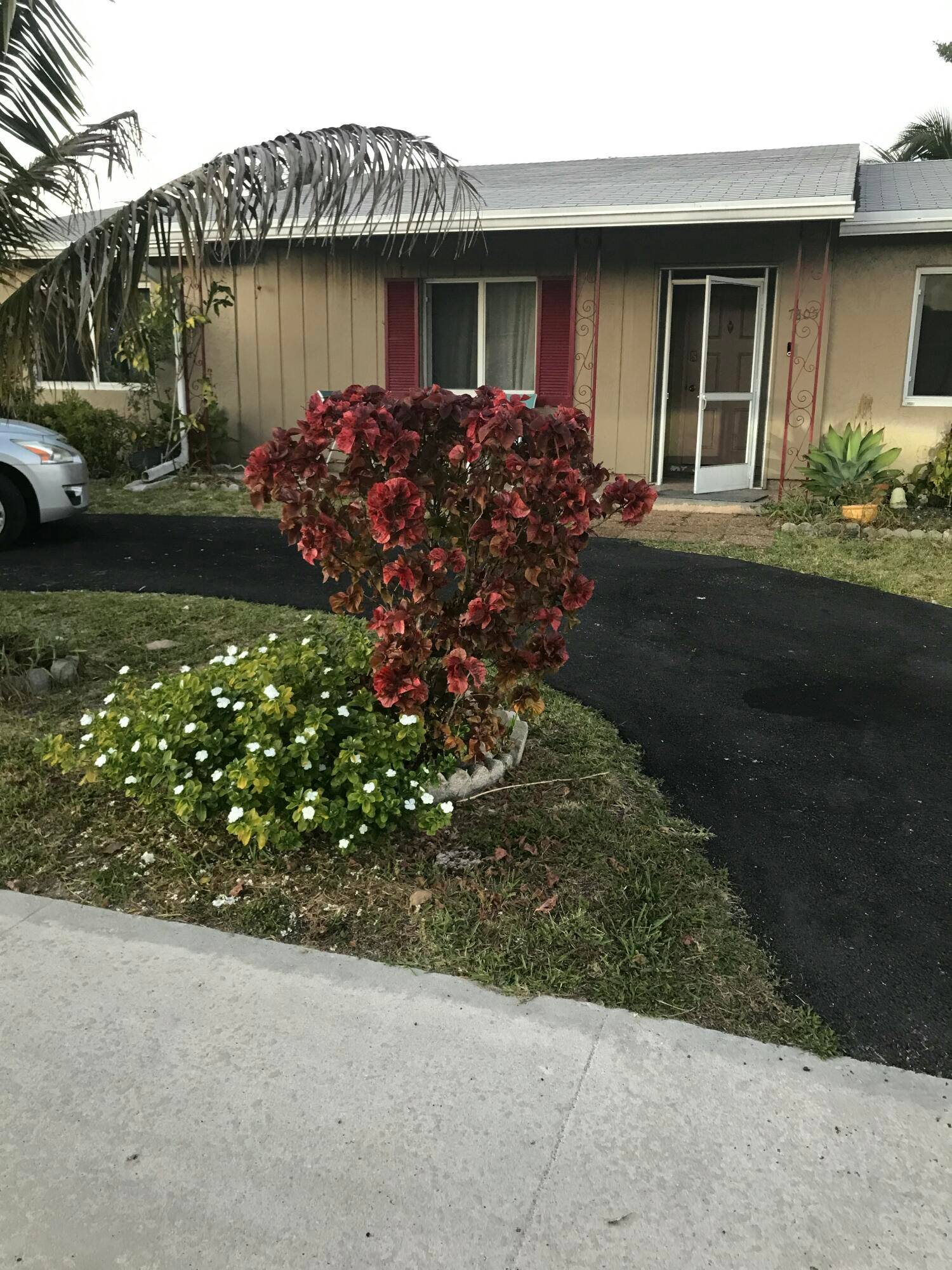 Large home with tile floor throughout, impact windows and doors, AC is 4 years old, Roof 4 years old, newer hot water heater.
