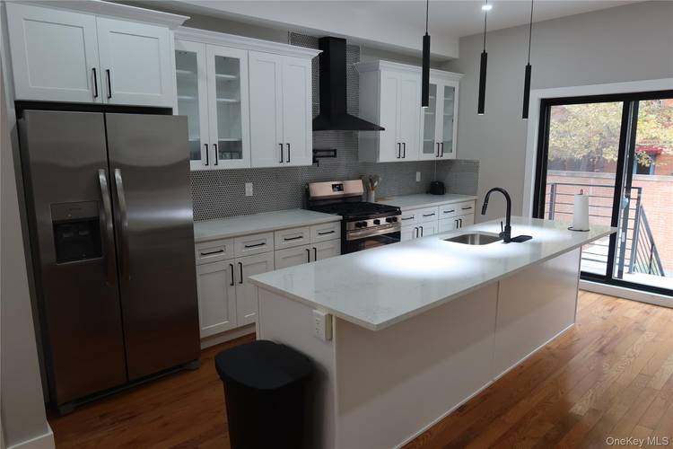 Welcome to this renovated 3 bedroom, 3 full bath duplex at 465 East 143rd Street in the Bronx.