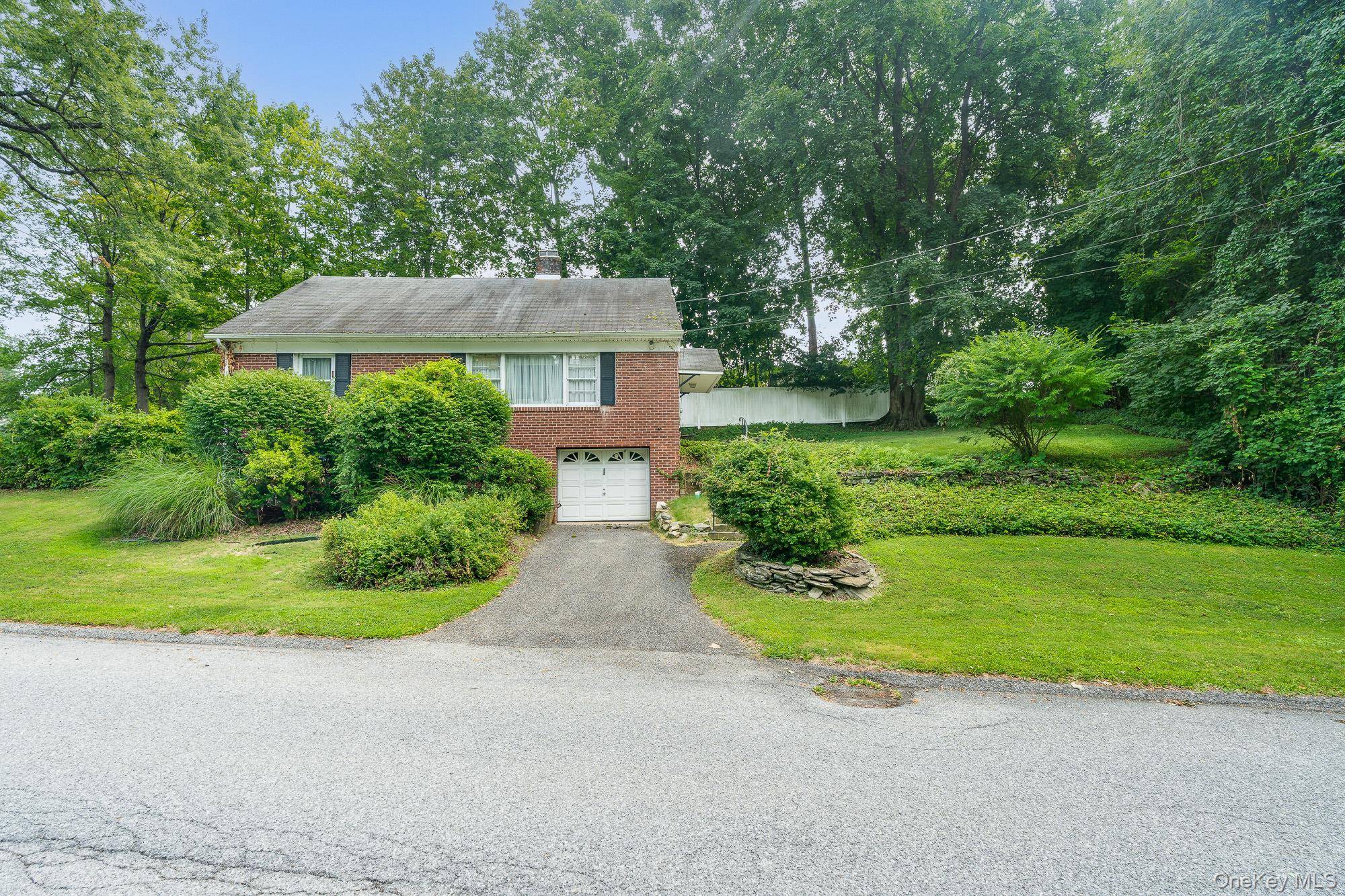 Charming 3 bedroom, 2 full bath Cape that lives like a 4 in the highly sought after Spackenkill School District !