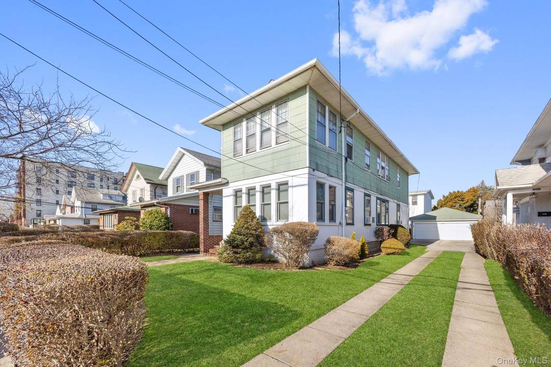 The property is a 2 story plus full basement two family house.