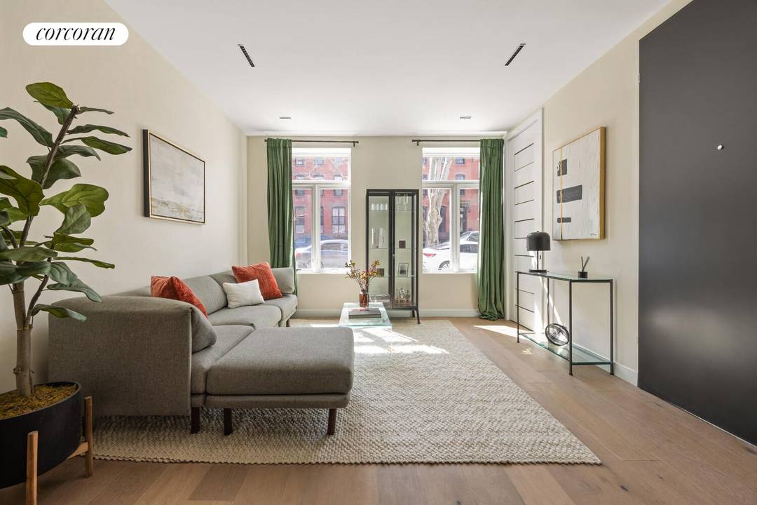 Welcome to 21 Lefferts Place, Unit 1 a thoughtfully designed two bedroom, two and a half bathroom garden duplex spanning 1, 566 square feet, complete with over 800 square feet ...