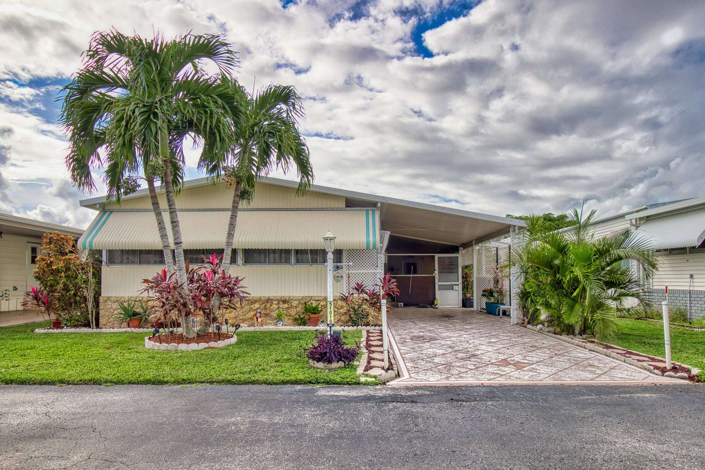 Welcome to this distinctive 2 bedroom, 2 bathroom double wide modular home, offering rare features and thoughtful upgrades that blend comfort, style, and sustainability.