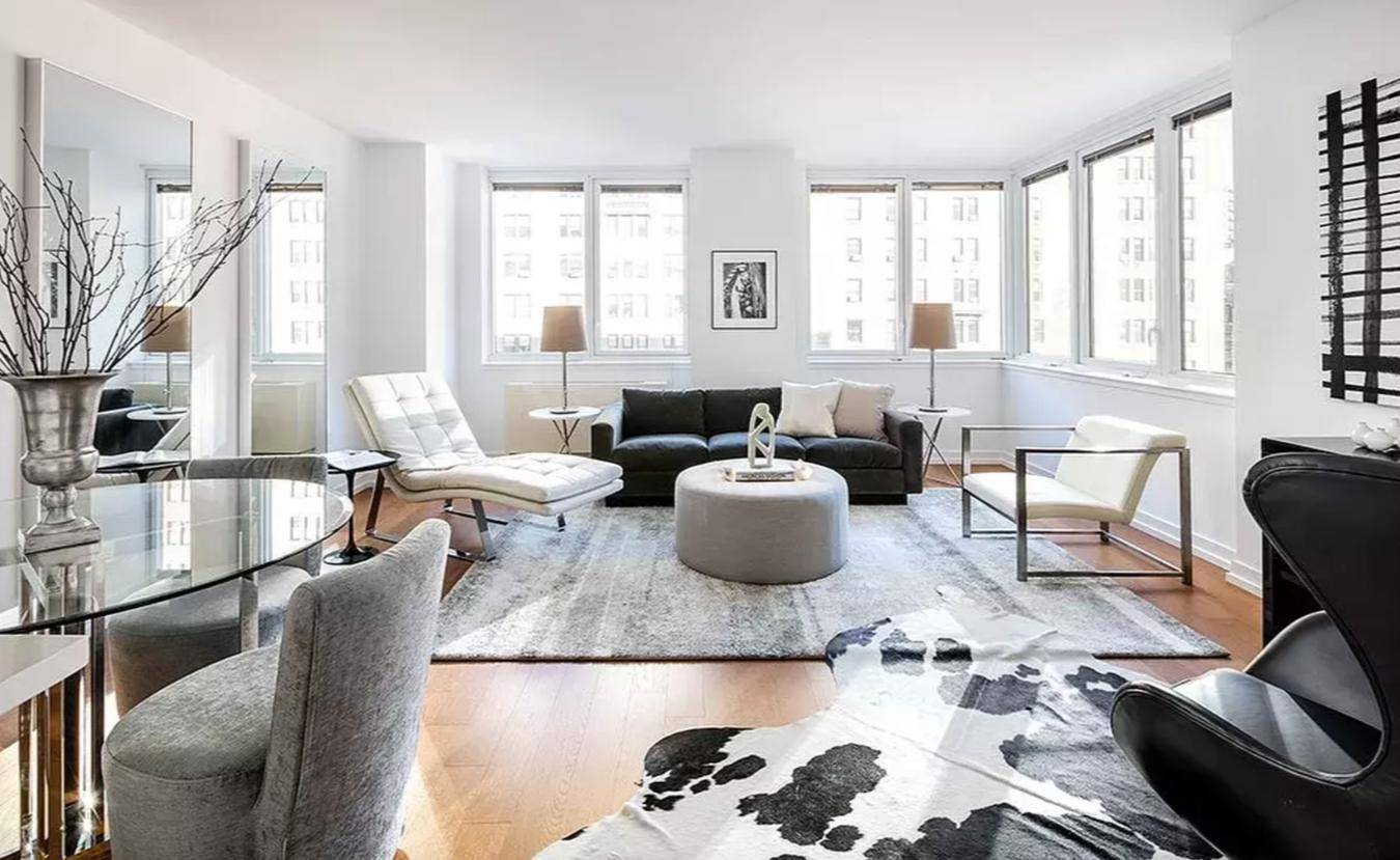 New to market big corner 2 bed 2 bath with amazing curved glass living room windows featuring amazing panoramic views of Broadway and uptown NYC.