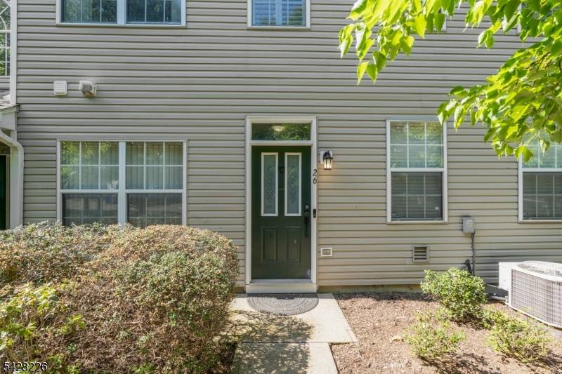 Welcome to sought after Four Oaks, where style, space, and convenience come together in this exceptional end unit townhome tucked away on a quiet cul de sac.