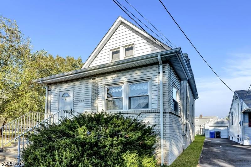 Welcome to this charming 2 bedroom, 2 bathroom home that sits on a generously sized lot, offering both comfort and potential.