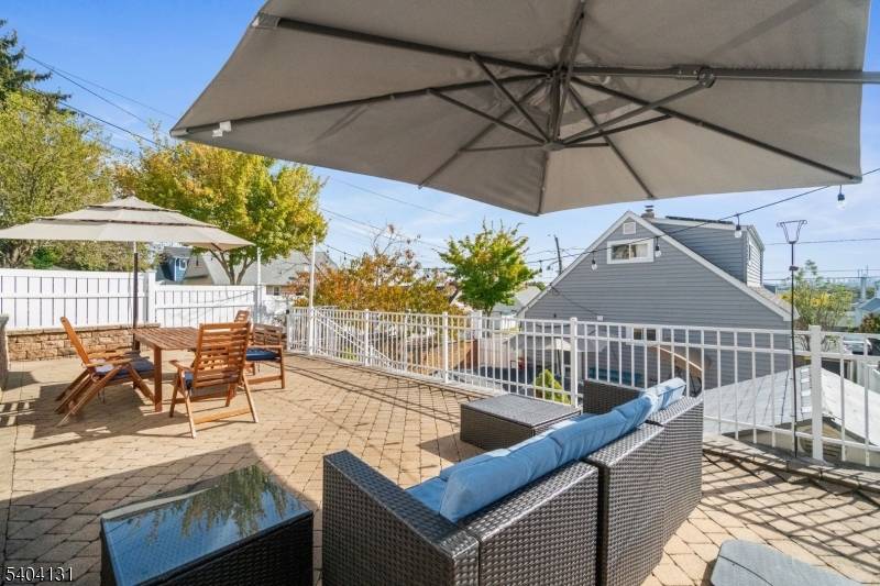 Welcome to this beautifully updated, corner lot property located in the heart of Carlstadt an excellent community with super low tax !