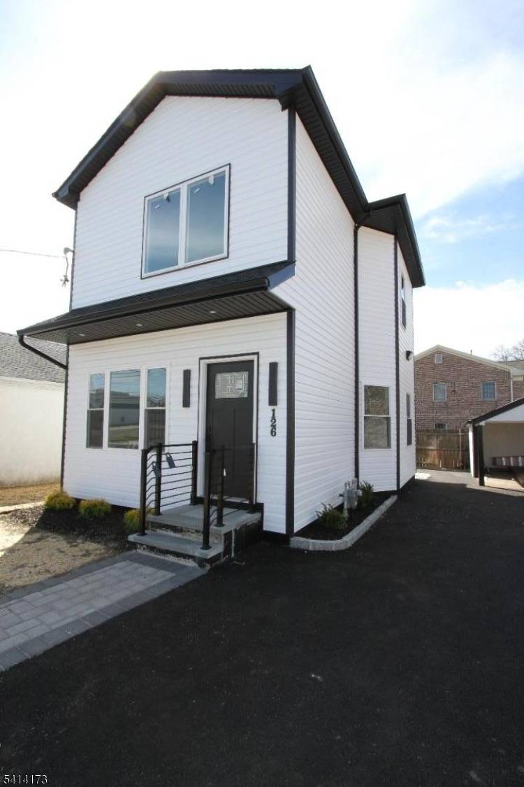Come see this totally new home inclucing the foundation on a spacious level lot.