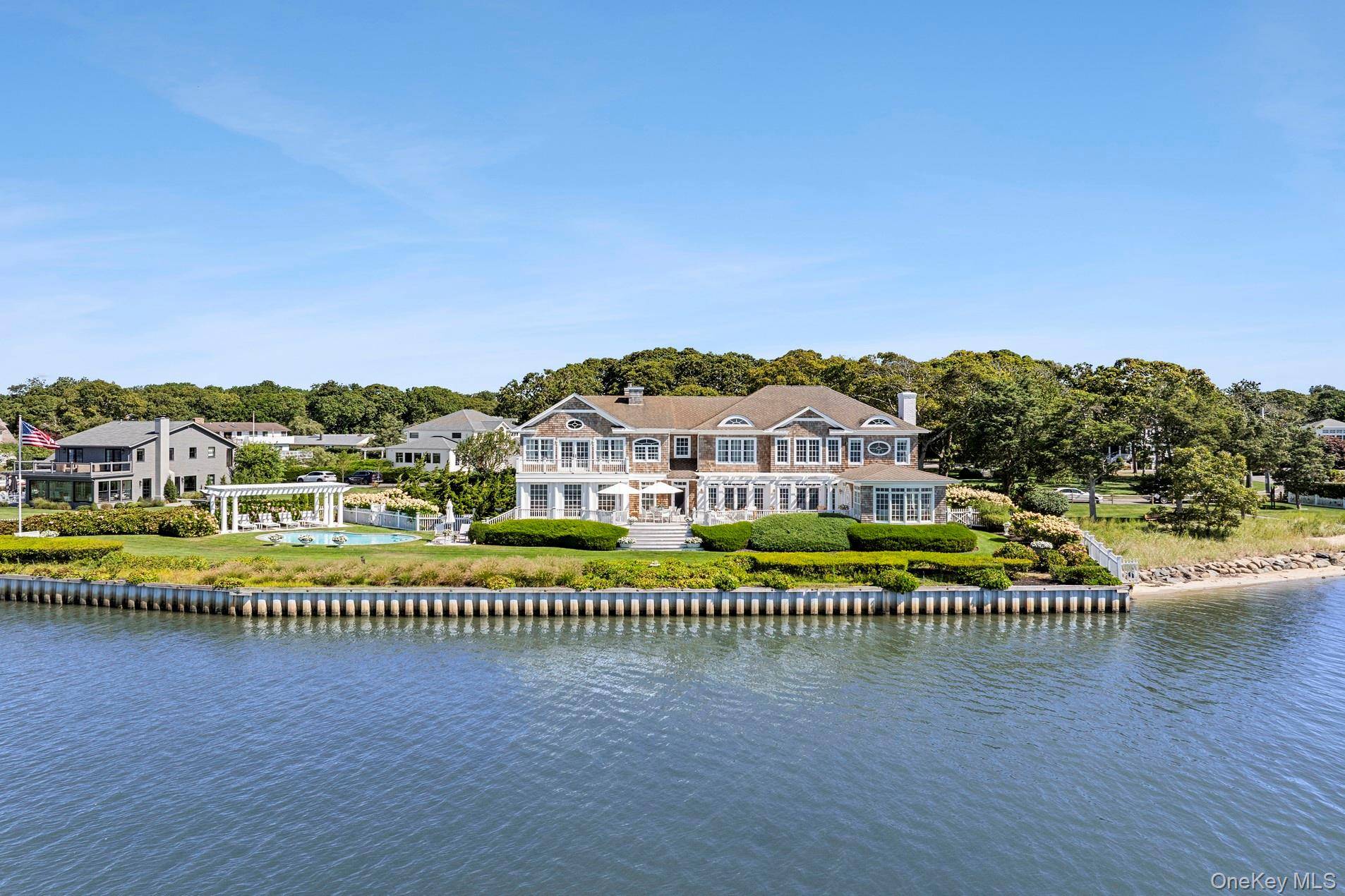 Welcome to this breathtaking waterfront retreat, where luxury and tranquility come together in perfect harmony.
