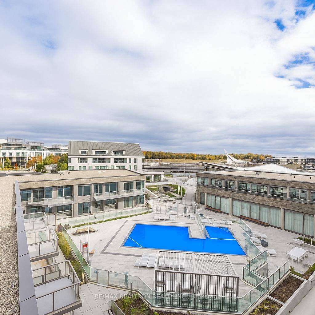 Welcome to resort luxury lakeside living in this beautifully upgraded 2 bedroom, 2 bathroom condo in the heart of Friday Harbour Resort.