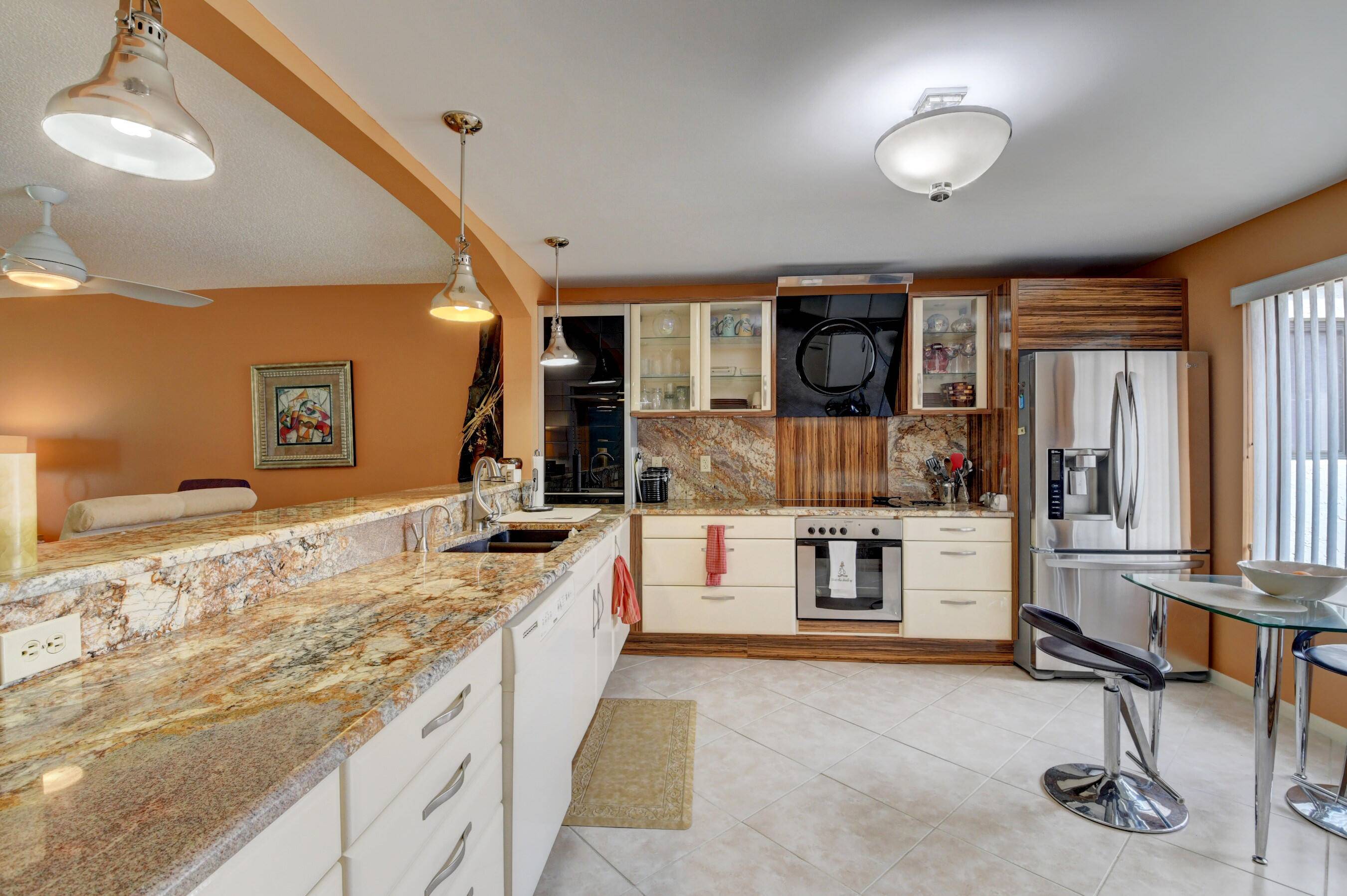 TWO BEDROOM TWO BATH CONDO OVERLOOKING GOLF COURSE IN GATED COMMUNITY.