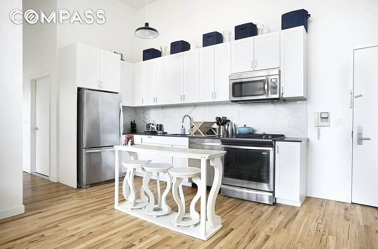 LOFT STYLE LIVING This delightful 2 bedroom 2 bath loft located at the famed Candy Factory Lofts is the definition of a truly unique apartment.
