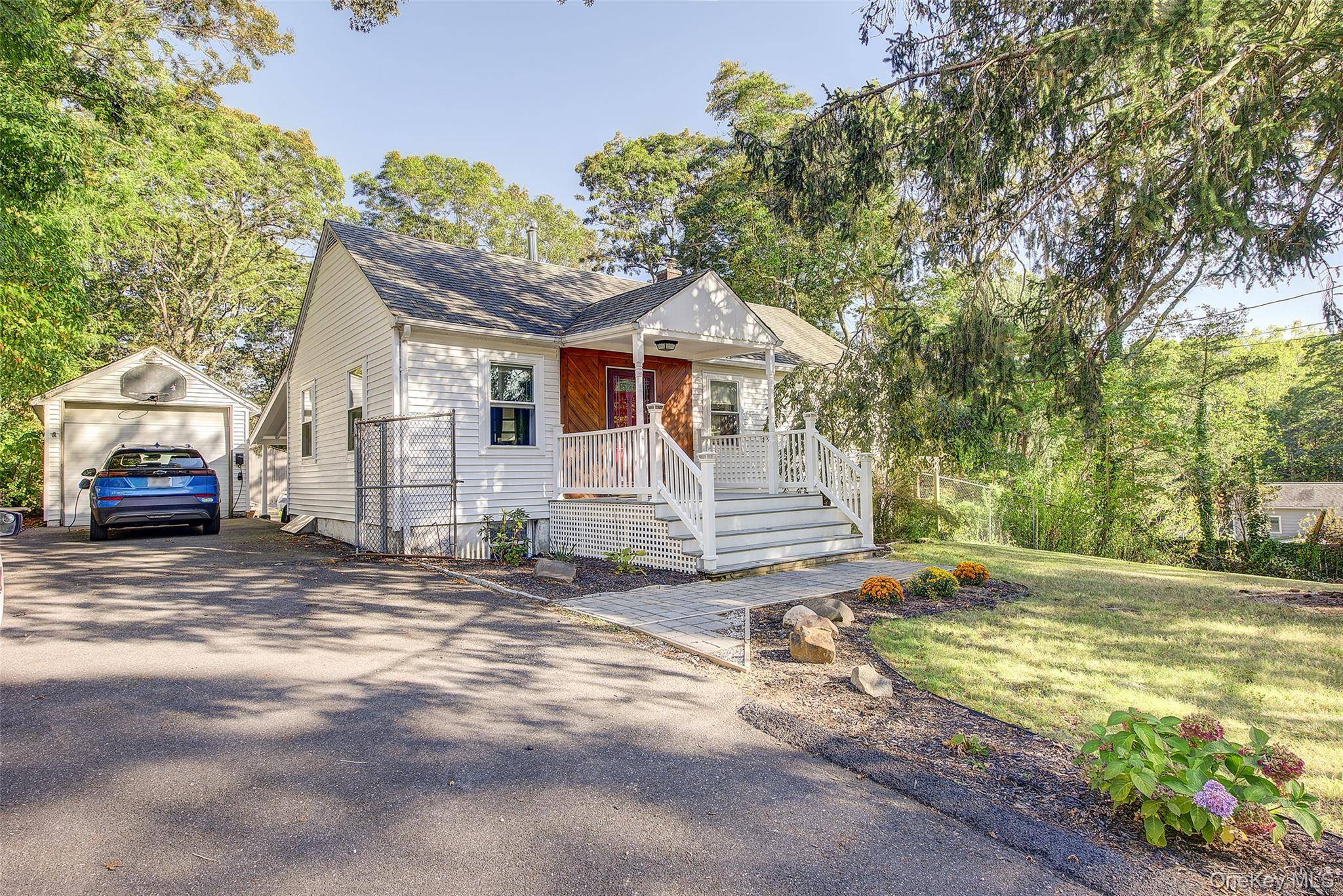 Welcome home to this sweet ranch style house surrounded by woods on almost half an acre.