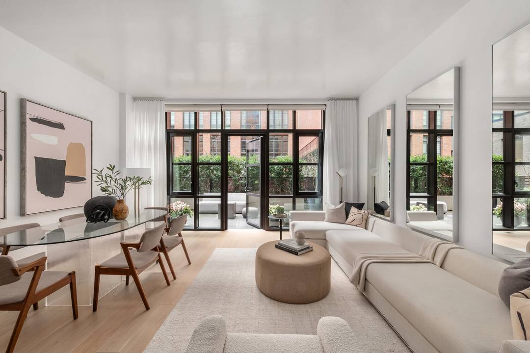 A one of one Garden level duplex in The Steiner, featured in Architectural Digest.