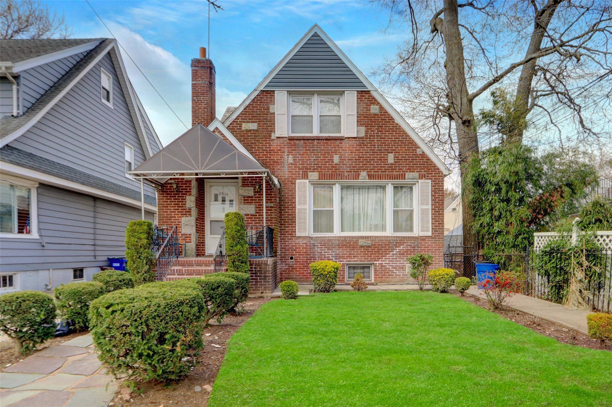 Welcome to this beautifully maintained 4 bedroom, 3 bathroom home located in the heart of Jamaica, offering a perfect blend of charm, space, and potential.