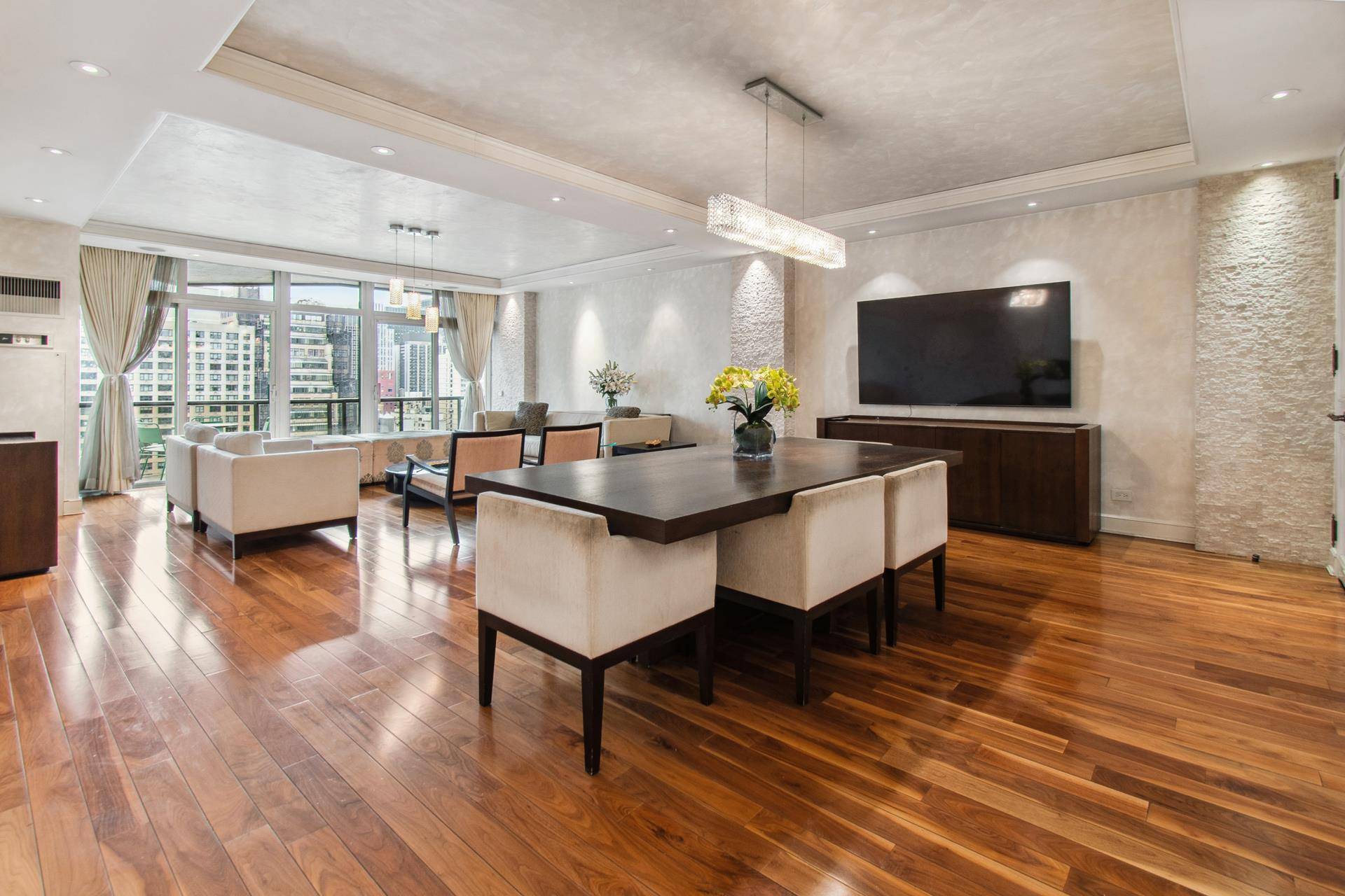 Perched on the 30th floor of one of Midtown East's most distinguished condominium buildings, this beautifully appointed 3 bedroom, 3.