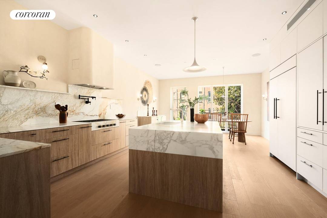 Welcome to 231 Macon Street, a custom crafted two family townhouse on a tree lined block in Bedford Stuyvesant, distinguished by its red brick facade, elegant black cornice, and landscaped, ...