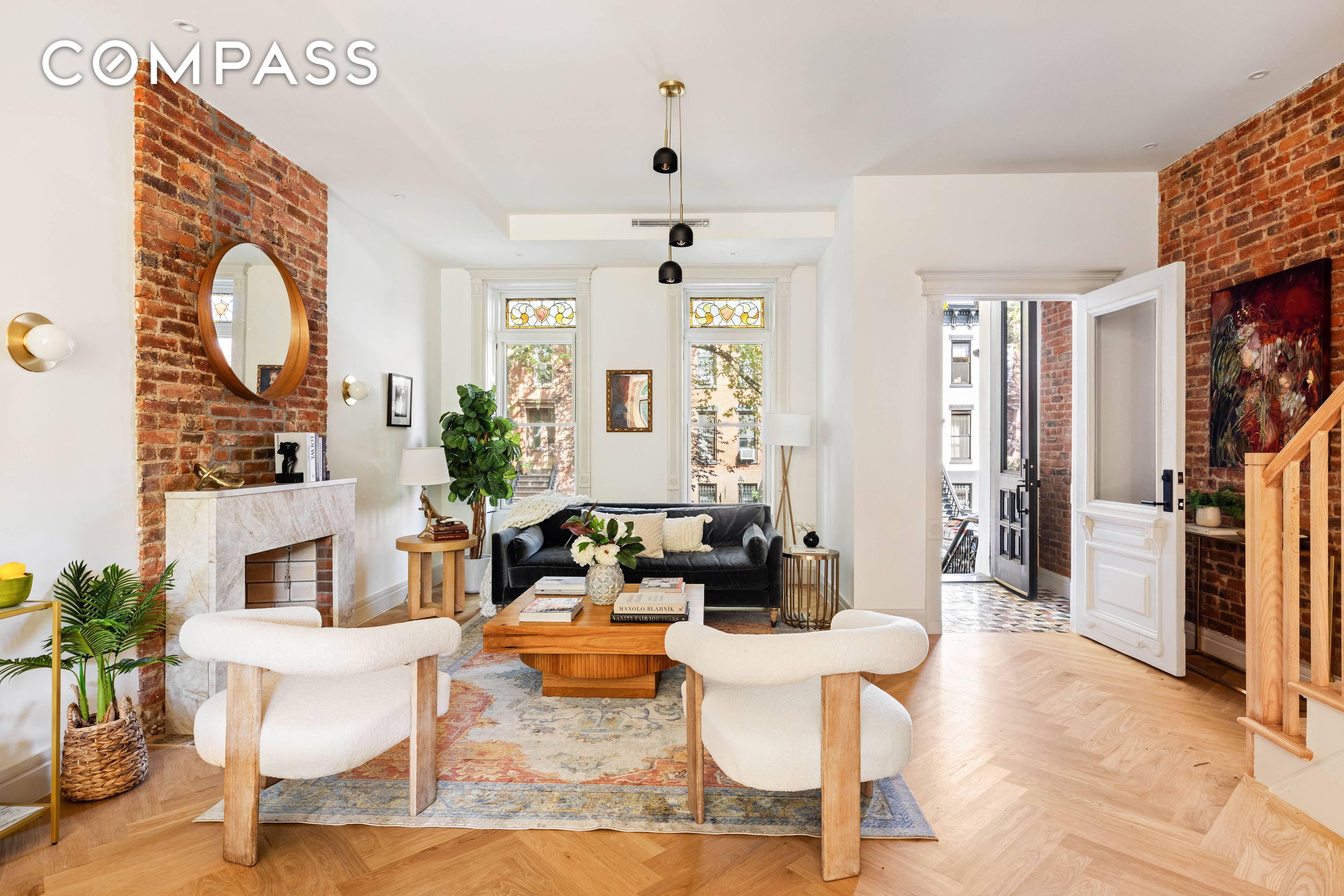 Built in 1899, 444 Quincy Street is a meticulously reimagined three story, two family brick townhouse that blends historic character with modern luxury.