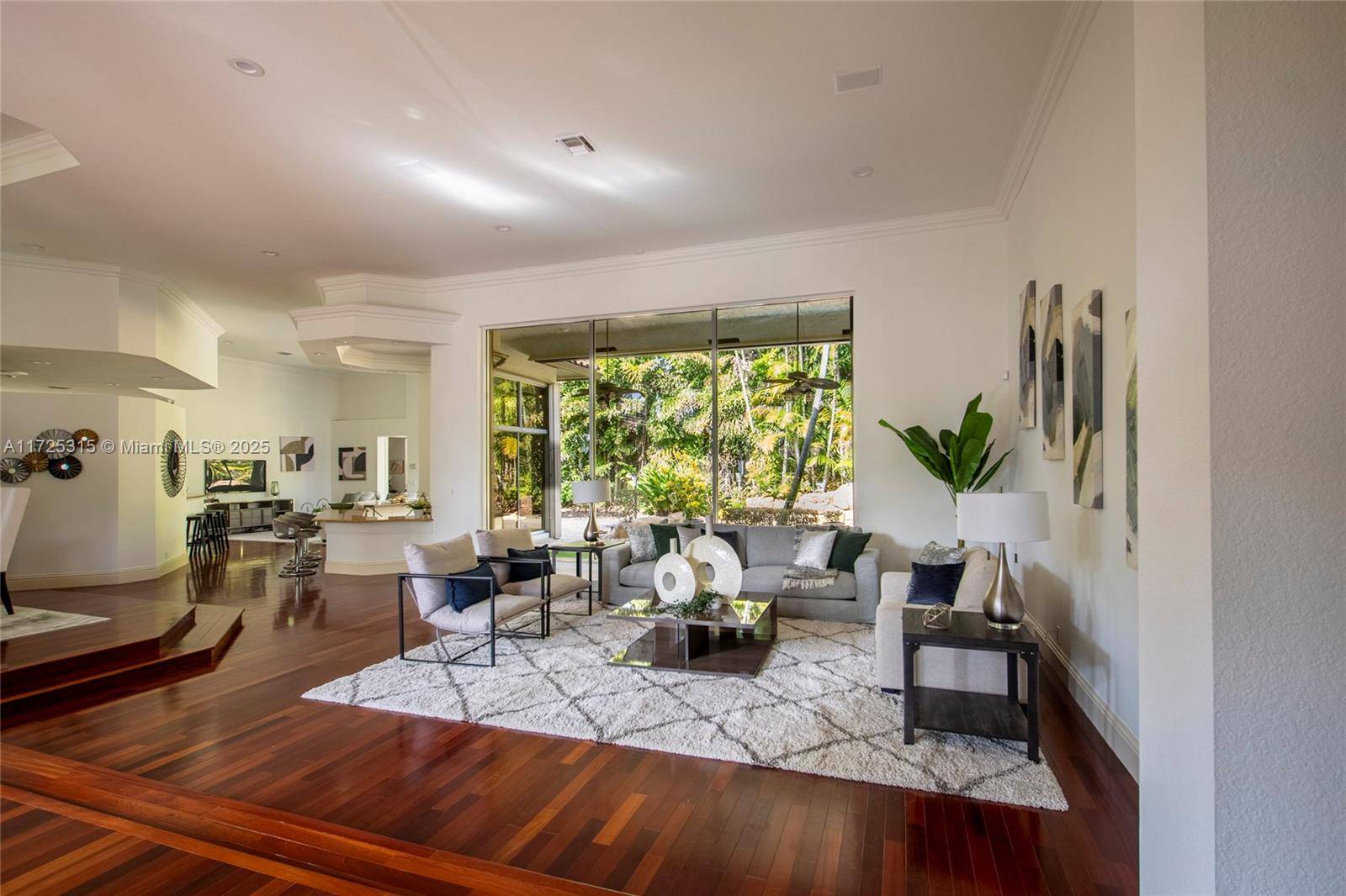 Set on beautifully landscaped 14418 sqft lot, this custom 3, 818 sqft residence offers 2020 roof, paver driveway, and accordion shutters.