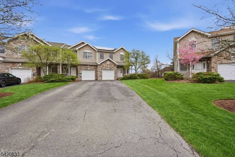 SPACIOUS END UNIT SYCAMORE MODEL townhome nestled at the end of a QUIET CUL DE SAC in the highly desirable MAZDABROOK Commons community.