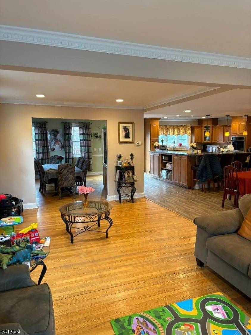 SIDE HALL COLONIAL HOME IN THE HEART OF PLEASANTDALE.