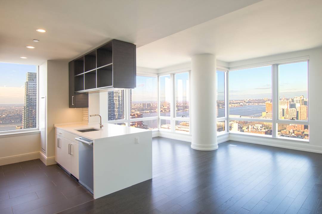 With sweeping views of the city from sunrise to sunset 555TEN towers over the new West Side.