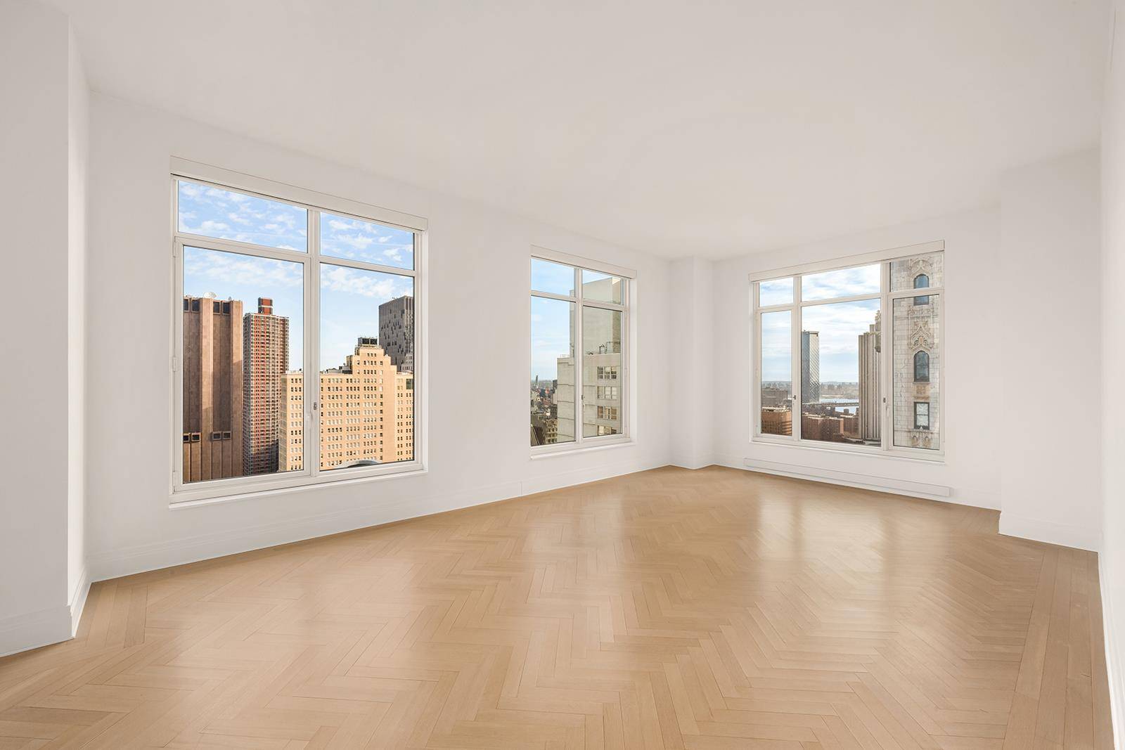This gracious two bedroom residence provides abundant light, and expansive northern and eastern city views.