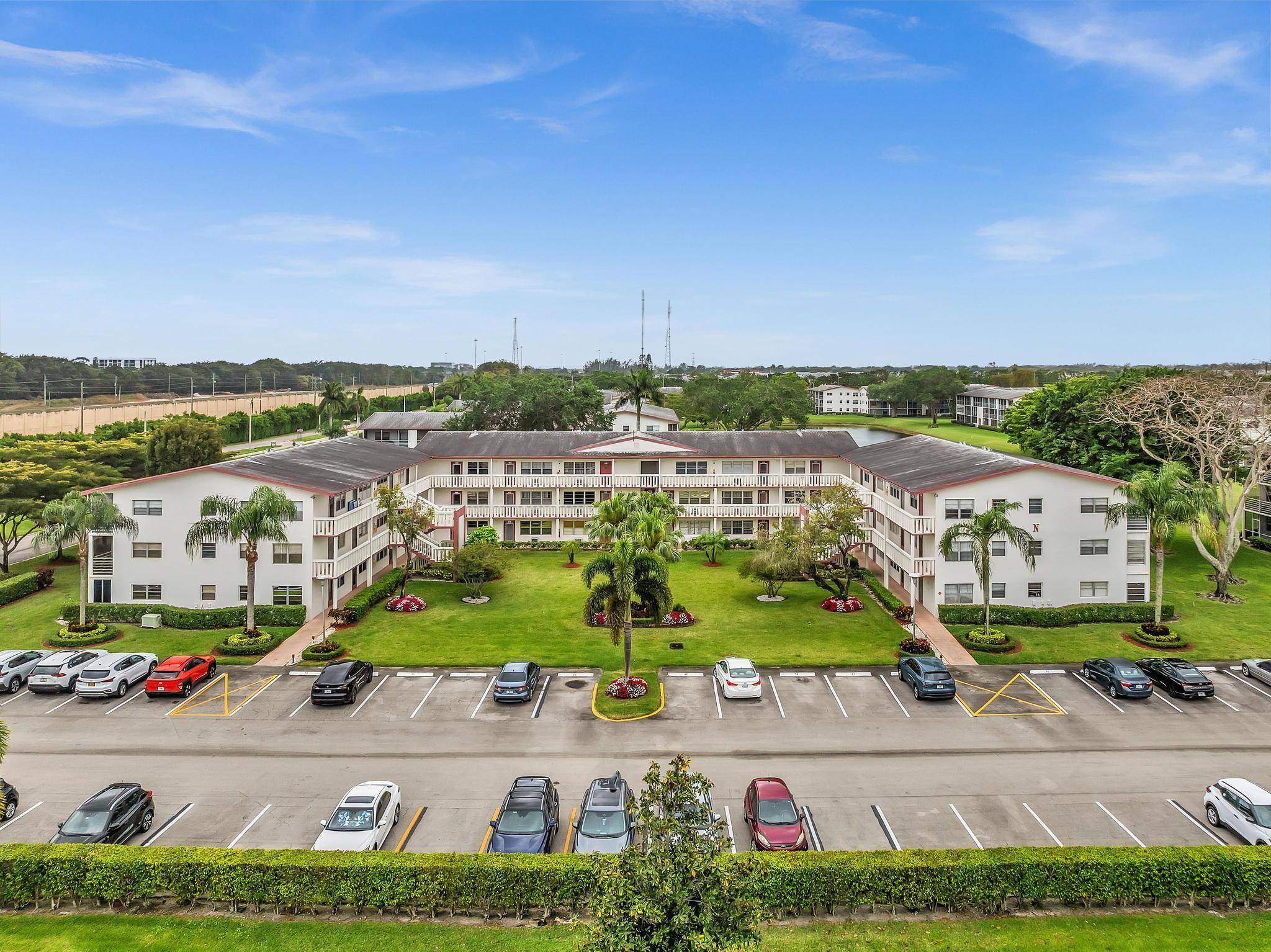 55 Community, beautiful third floor unit with a balcony facing east.