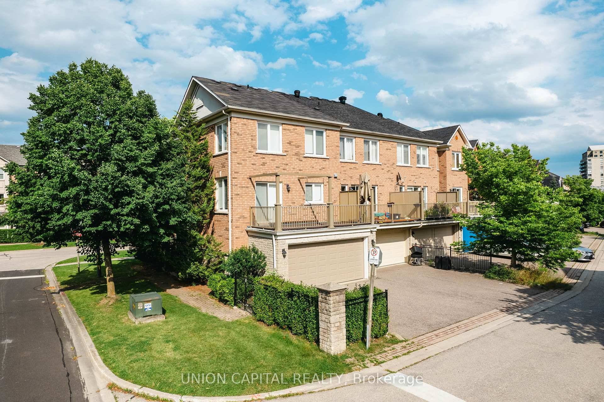 Discover the essence of convenient living in this renovated and spacious, rarely available double car garage end unit townhouse.