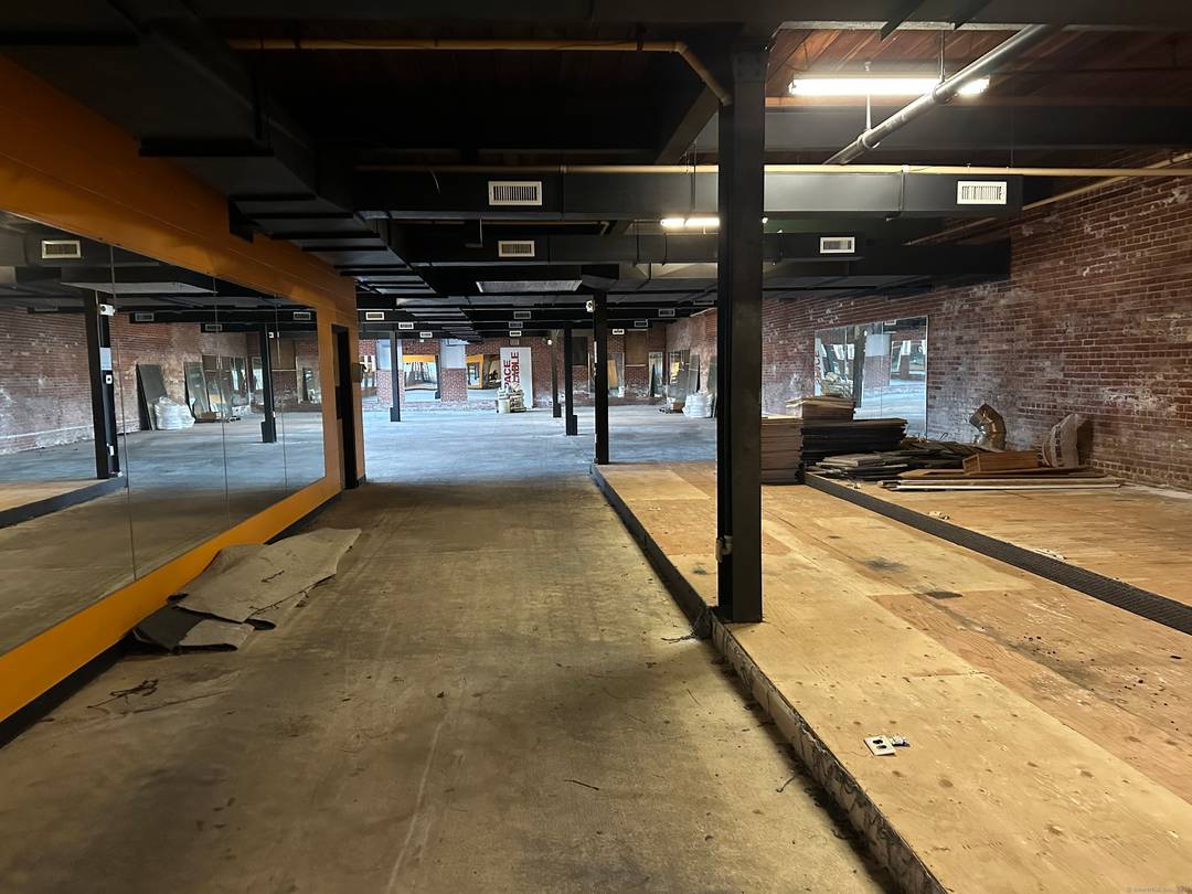 Step into the past while embracing the future with this captivating brick commercial building, nestled in a prime location with mixed use zoning.