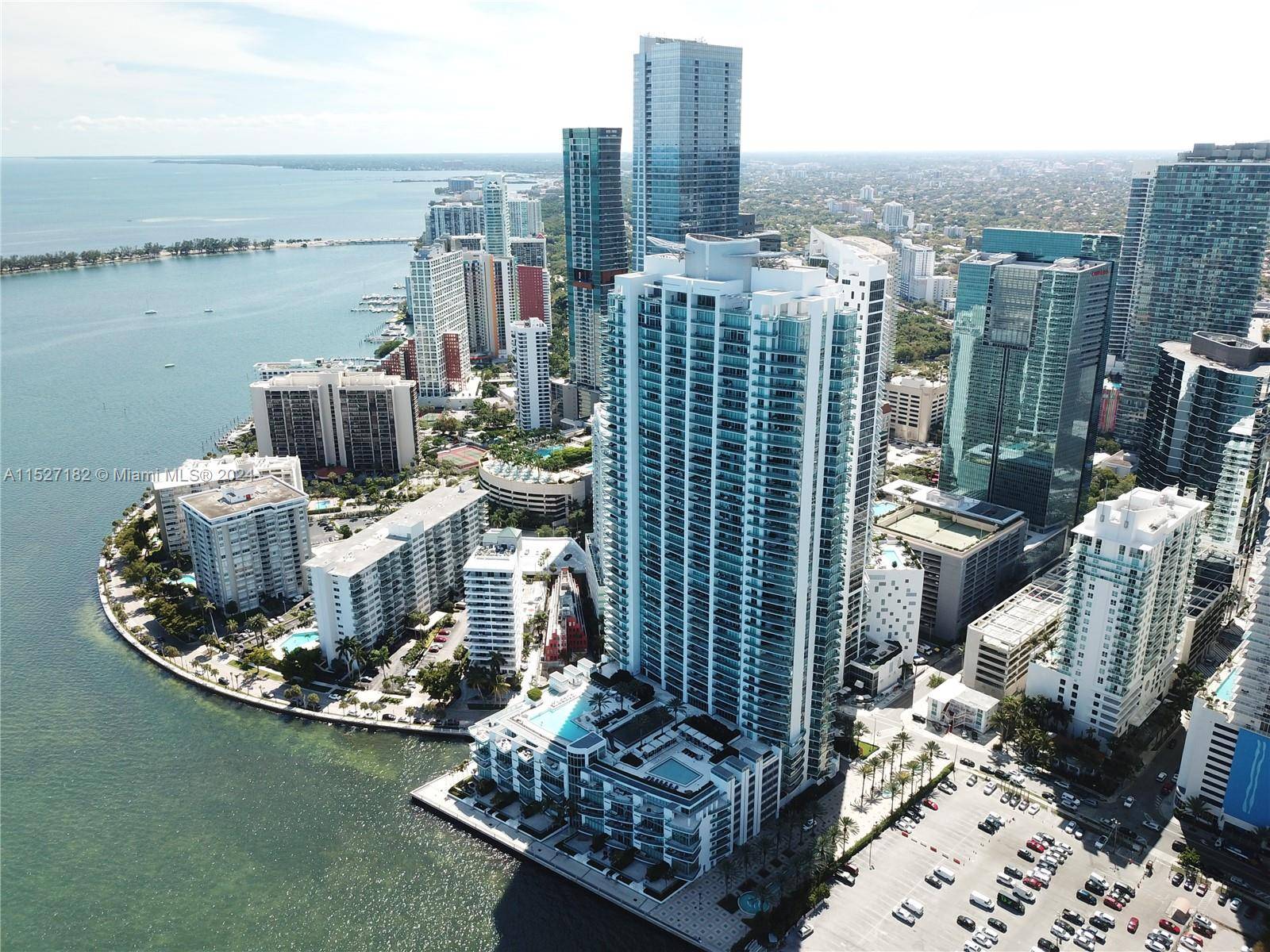 THIS RARELY AVAILABLE DIRECT OCEAN FRONT FURNISHED 4 4 1 2 BATH JADE RESIDENCE OFFERS TERRACE SPACE TO DIE FOR WITH SPECTACULAR VIEWS OF BISCAYNE BAY THE MIAMI SKYLINE AS ...