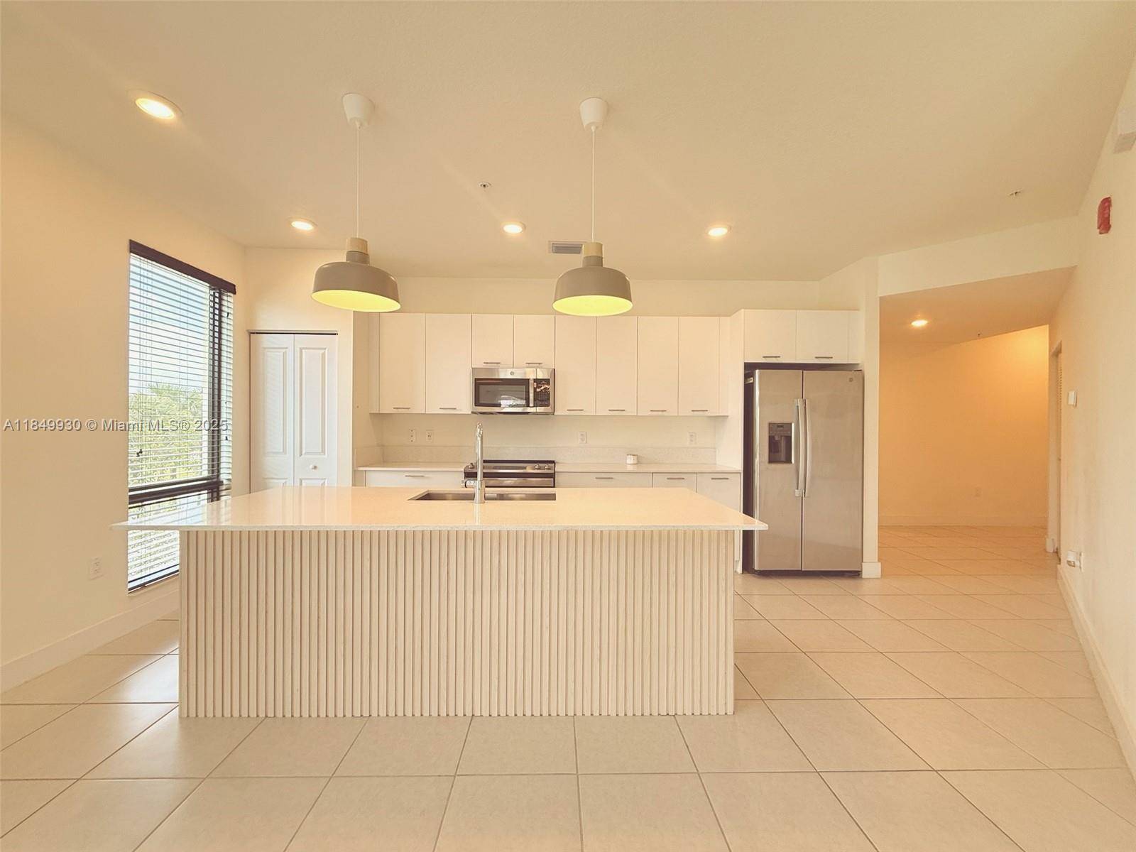 Don t miss this amazing opportunity to own a beautifully designed corner unit in the heart of Downtown Doral !