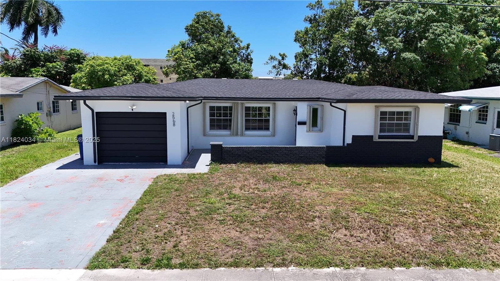 Discover this beautifully updated 4 bedroom, 2 bath single family home in the heart of Lauderdale Lakes !